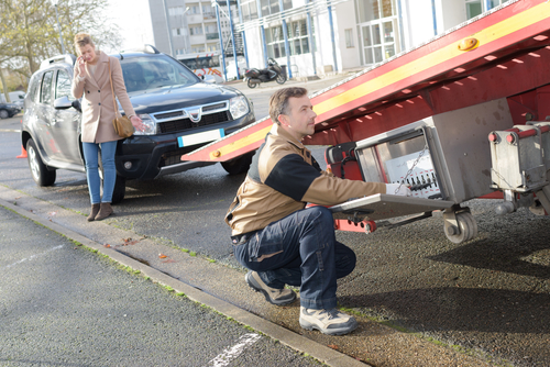 tow truck in the street