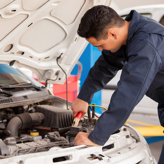 Using jumper cables to start a car